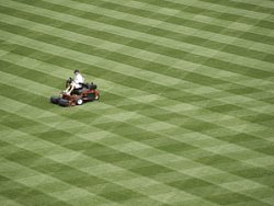 Lawn striping like a pro. Sports field mowing pattern